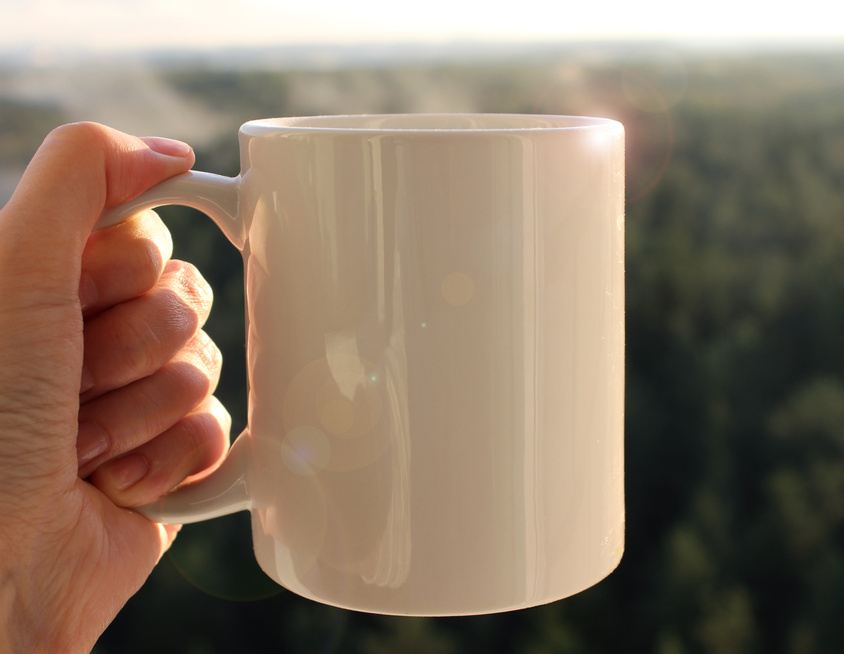 White mug in hand, Mockup